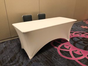 Table with white spandex